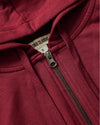 Womens Dark Maroon Crop Zip Hoodie showing zipper, drawcords, and label.