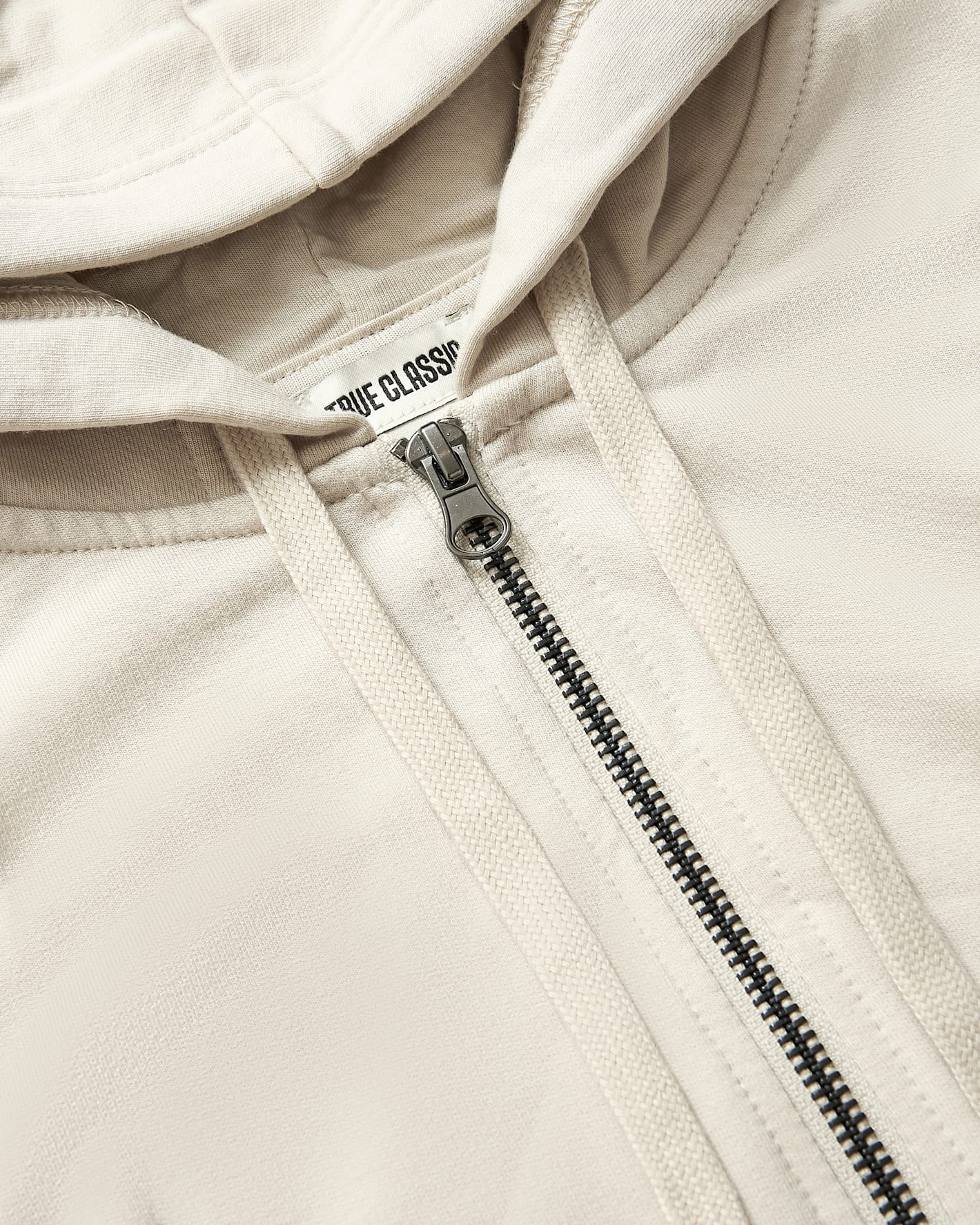 Womens Oatmeal Crop Zip Hoodie with drawcord hood and metal zipper.