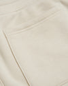 Dune Fleece French Terry Joggers close-up showing patch pocket and stitching.