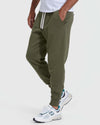 Military Green Pullover Fleece Hoodie & Jogger 2-Pack with sneakers.