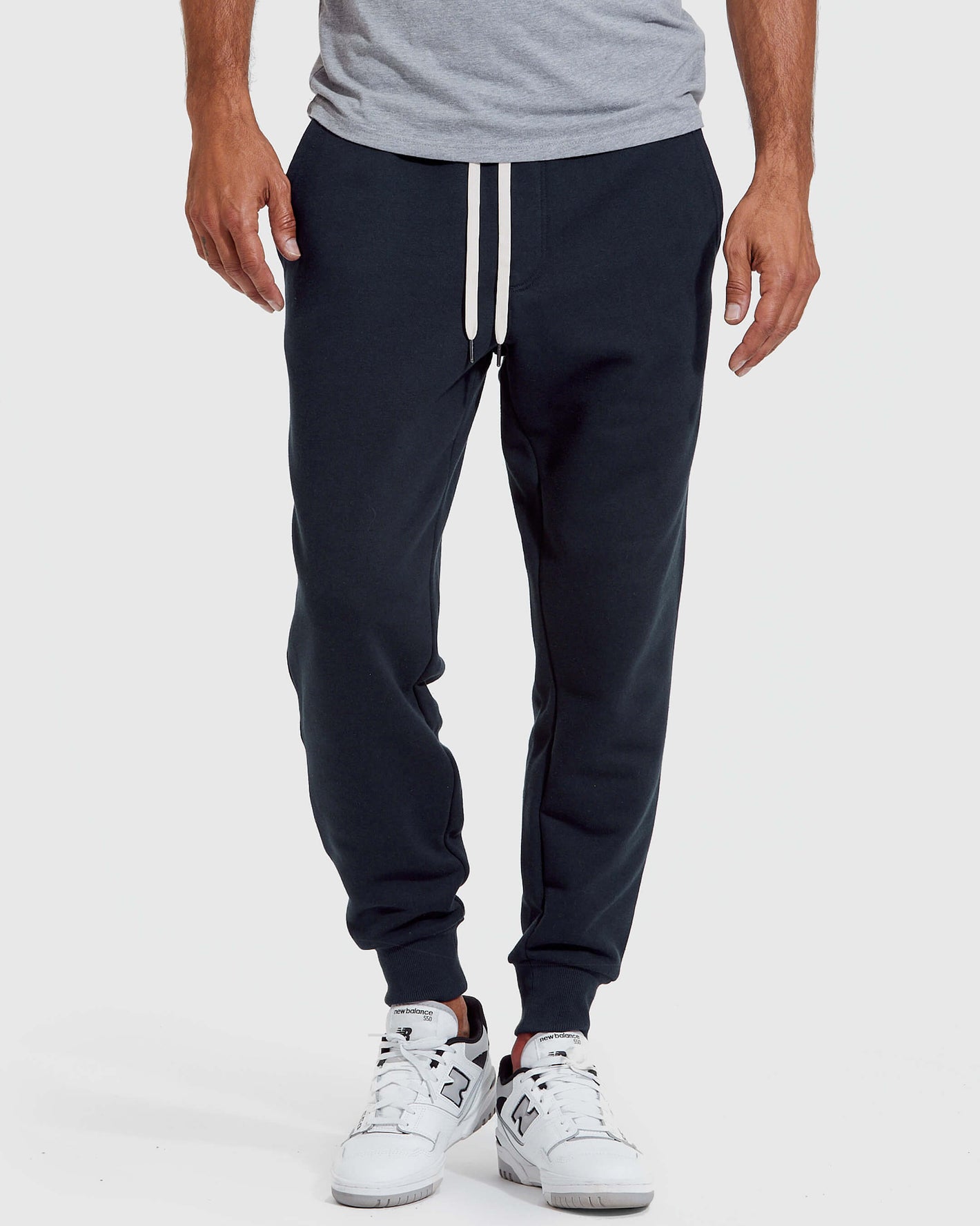 Navy Full Zip Fleece Hoodie & Jogger 2-Pack with New Balance sneakers.