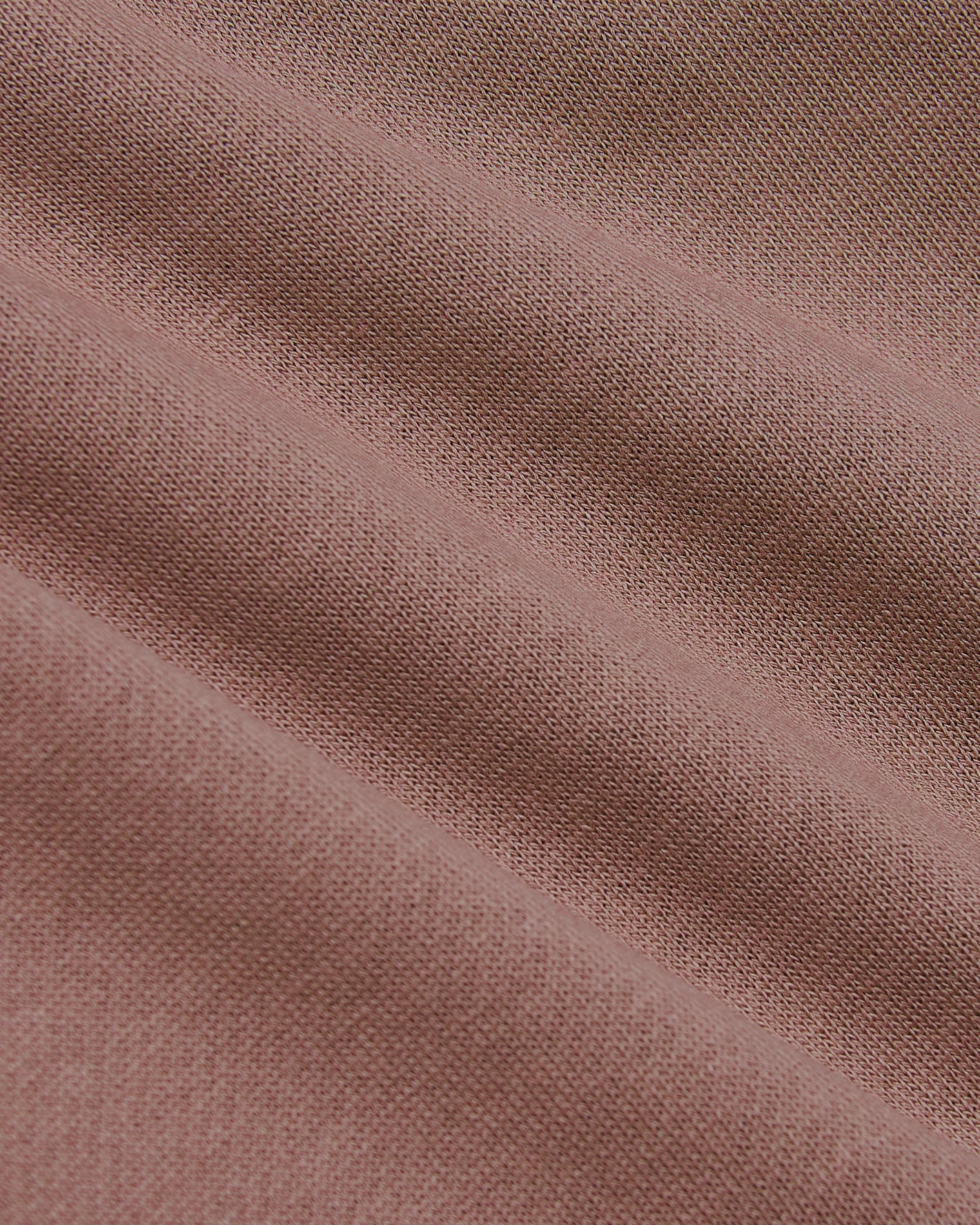 Slate Mauve Pullover Fleece Crew & Jogger close-up of pink knit fabric.