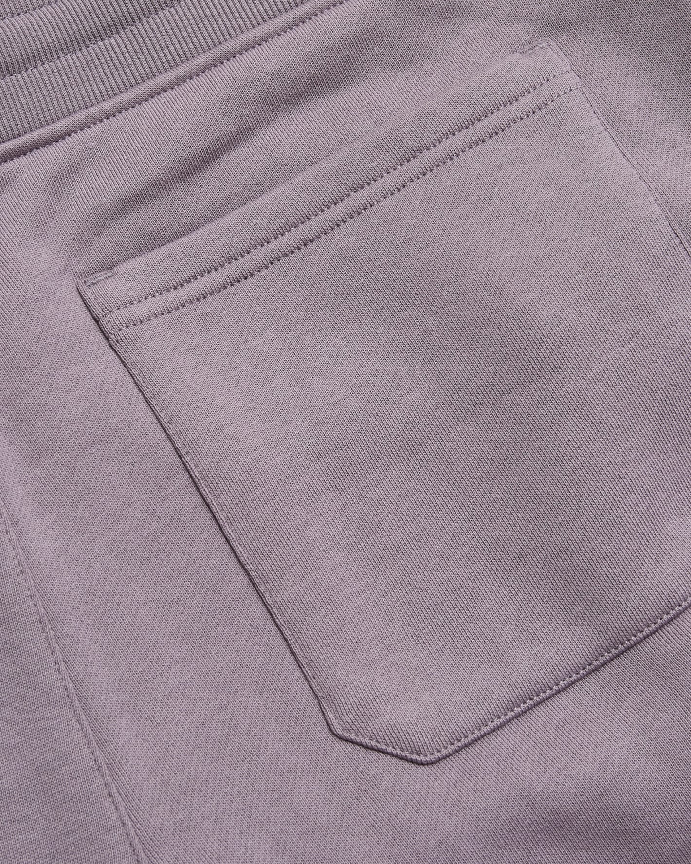 Thistle Half Zip Fleece Sweatshirt & Jogger fabric close-up with patch pocket.