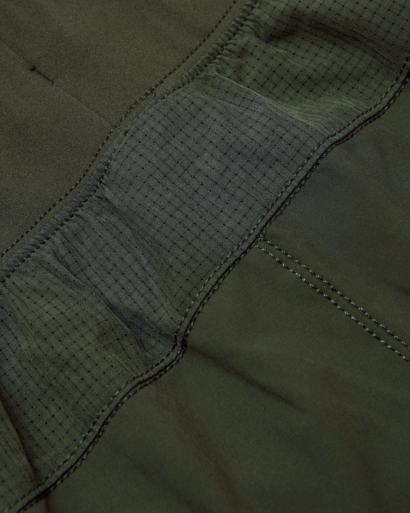 Kelp Active Training Joggers close-up, showcasing technical fabric and stitching.