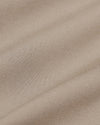 Khaki Commuter Pants close-up showing fine woven fabric texture.