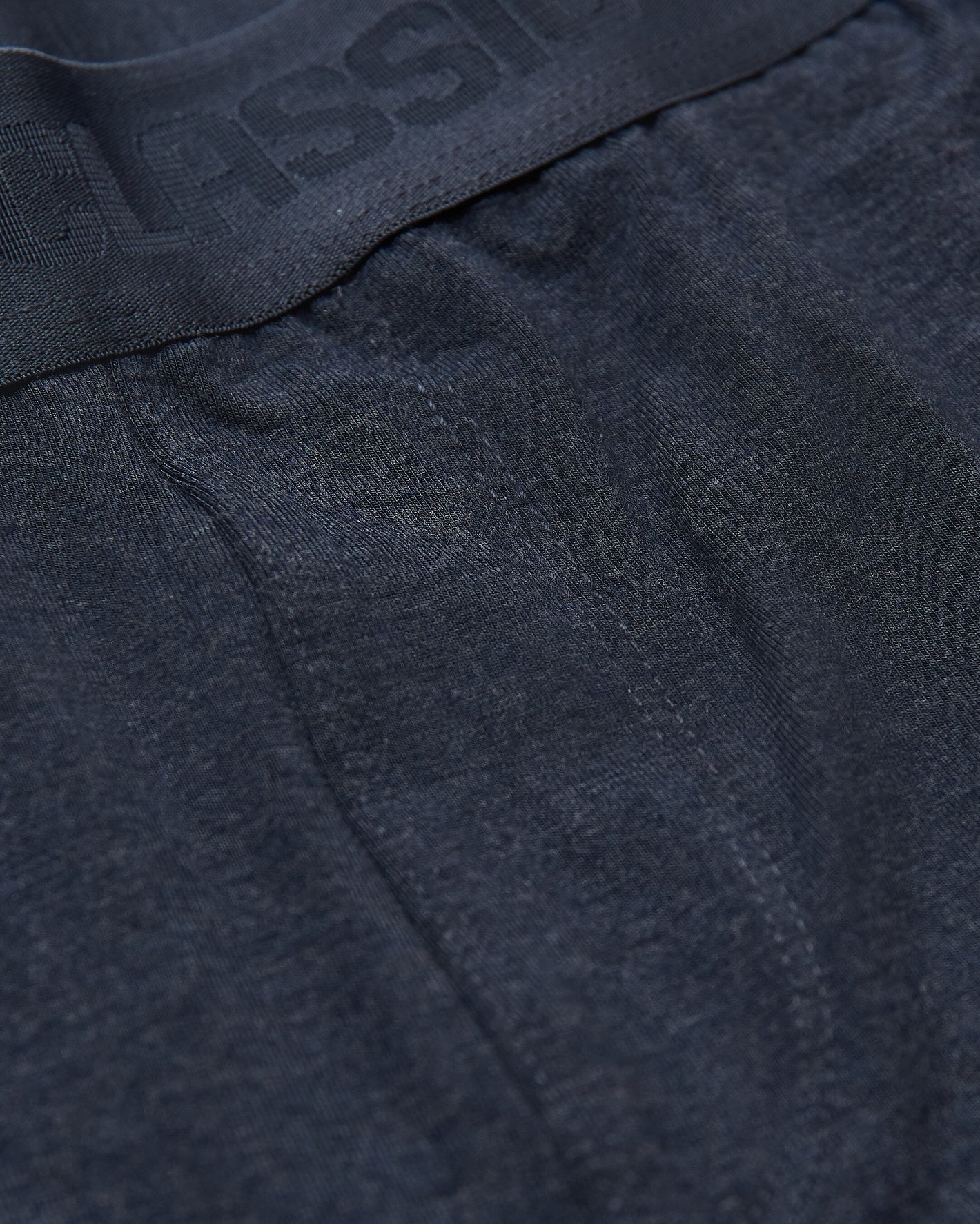 Heather Navy Loungewear Jogger, featuring embossed waistband and contour stitching.
