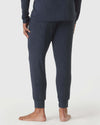 Heather Navy Loungewear Jogger on barefoot model, showcasing cuff-bottom design.