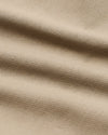 Khaki Slim Chino Pants 2.0, ultra-soft beige woven fabric close-up.
