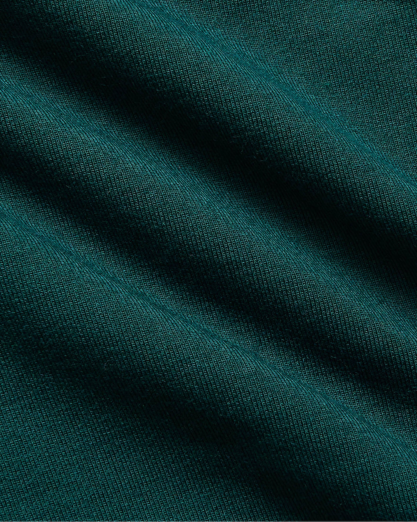 Womens Deep Emerald Slouch Pullover Crew & Relaxed Jogger fabric close-up.