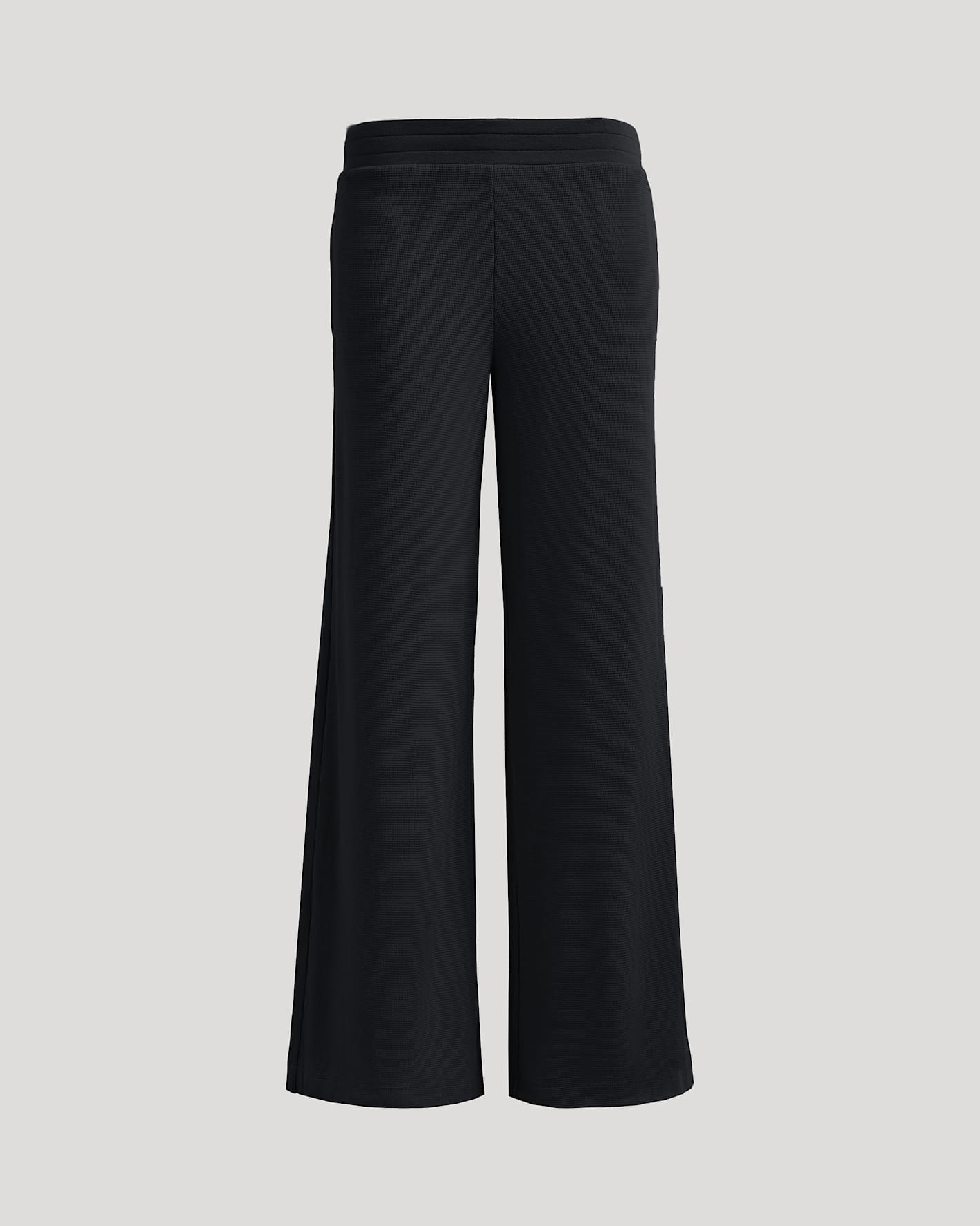Womens Black Waffle Wide Leg Pants with elastic waistband and loose silhouette.