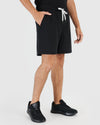 Wearing All Black Active Quick Dry Shorts with Liner, pocketed hand.