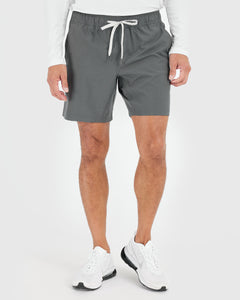 True Classic7 All Carbon Active Quick Dry Shorts worn by model.