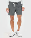 Active Quick Dry Shorts with Liner modeled with white athletic shoes.