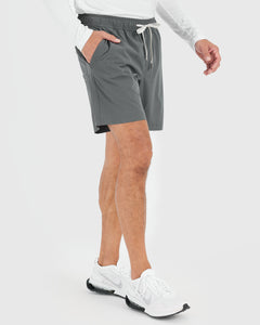True Classic7 All Carbon Active Quick Dry Shorts with sneakers.