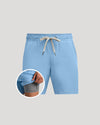 Light blue shorts with a drawstring on a gray background