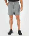 Neutral Active Comfort Shorts 3-Pack in heather-gray, mid-thigh length, with black running shoes.
