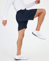 Person in motion wearing Black & Dark Heather Navy Active Comfort Shorts.