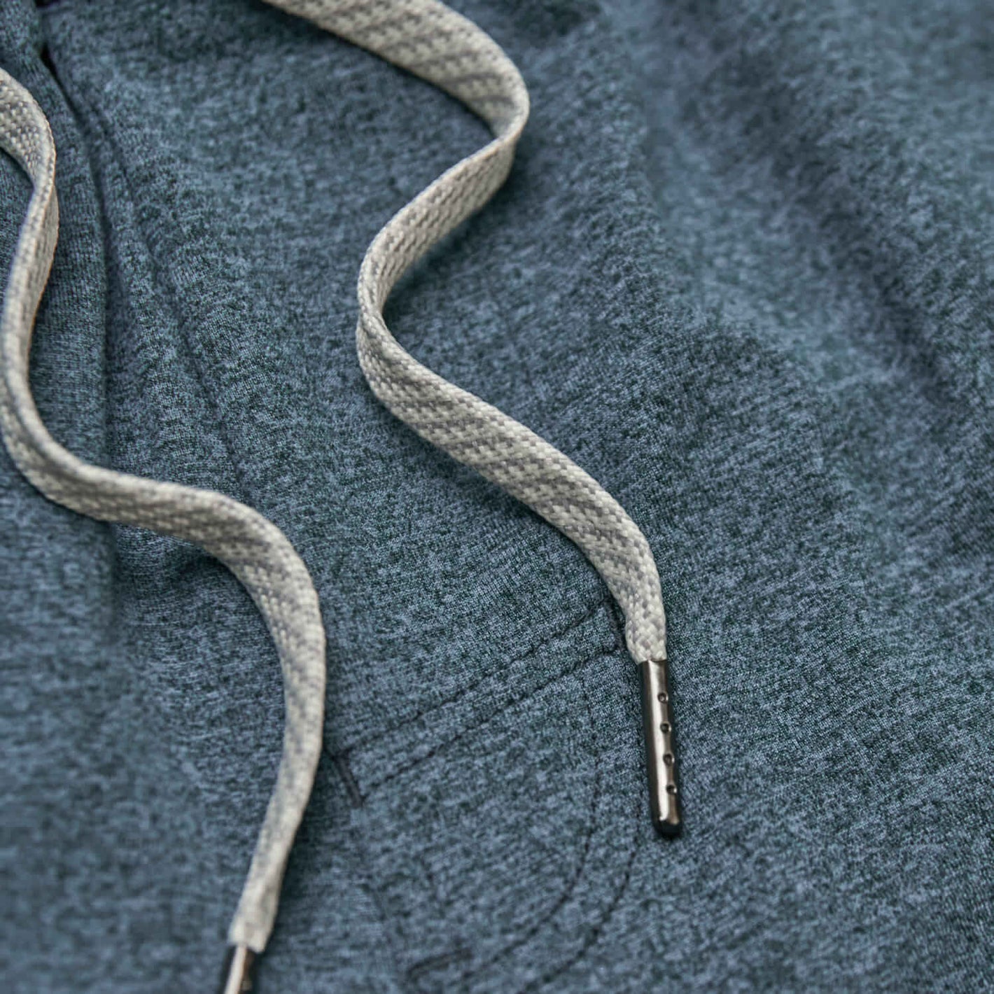 Dark Heather Indigo Active Comfort Shorts with woven drawstrings and metal aglets.