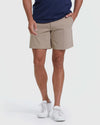 Khaki Commuter Short modeled with white sneakers, showcasing casual summer style.