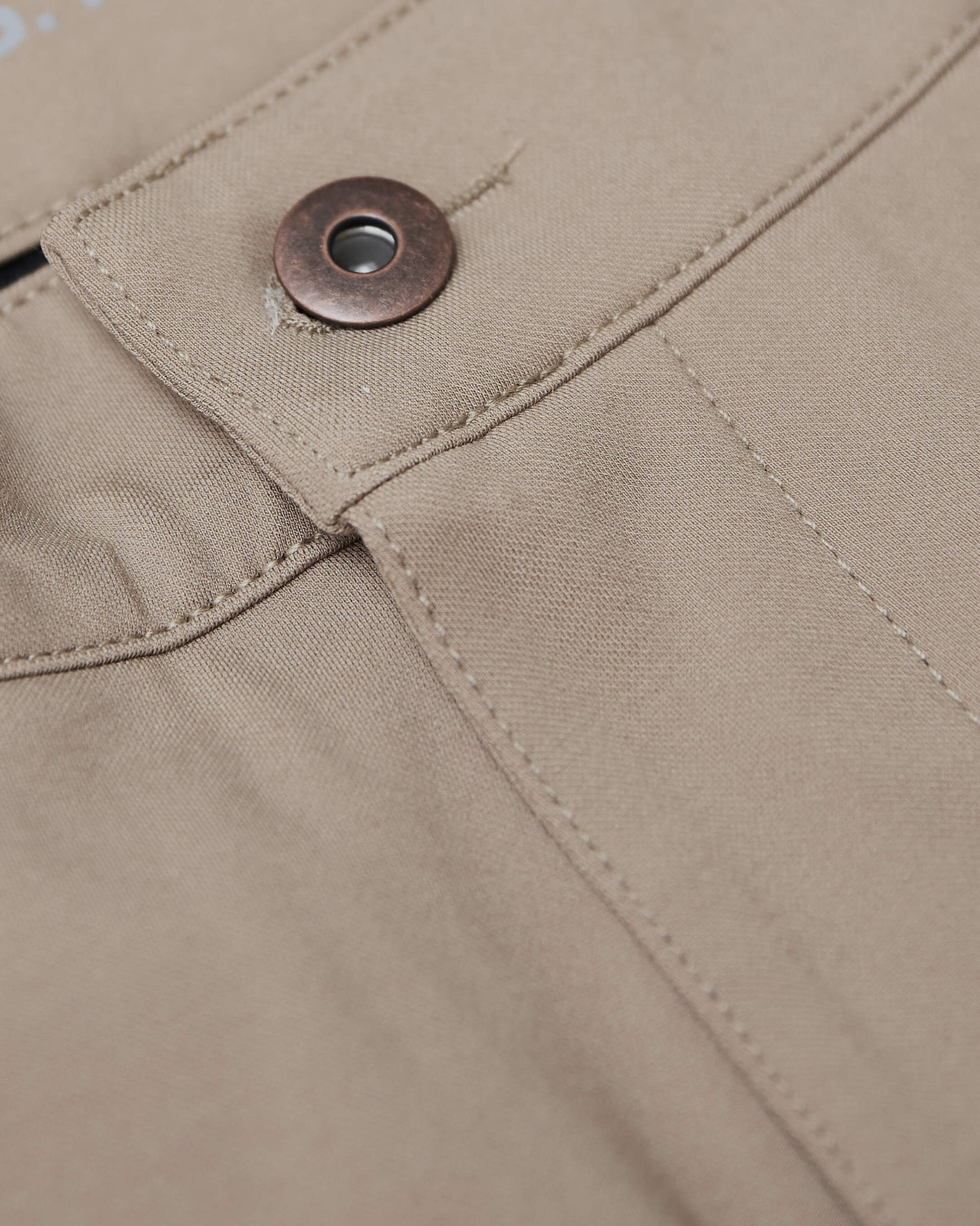 Khaki Commuter Short waistband with stitched seams and metal button.