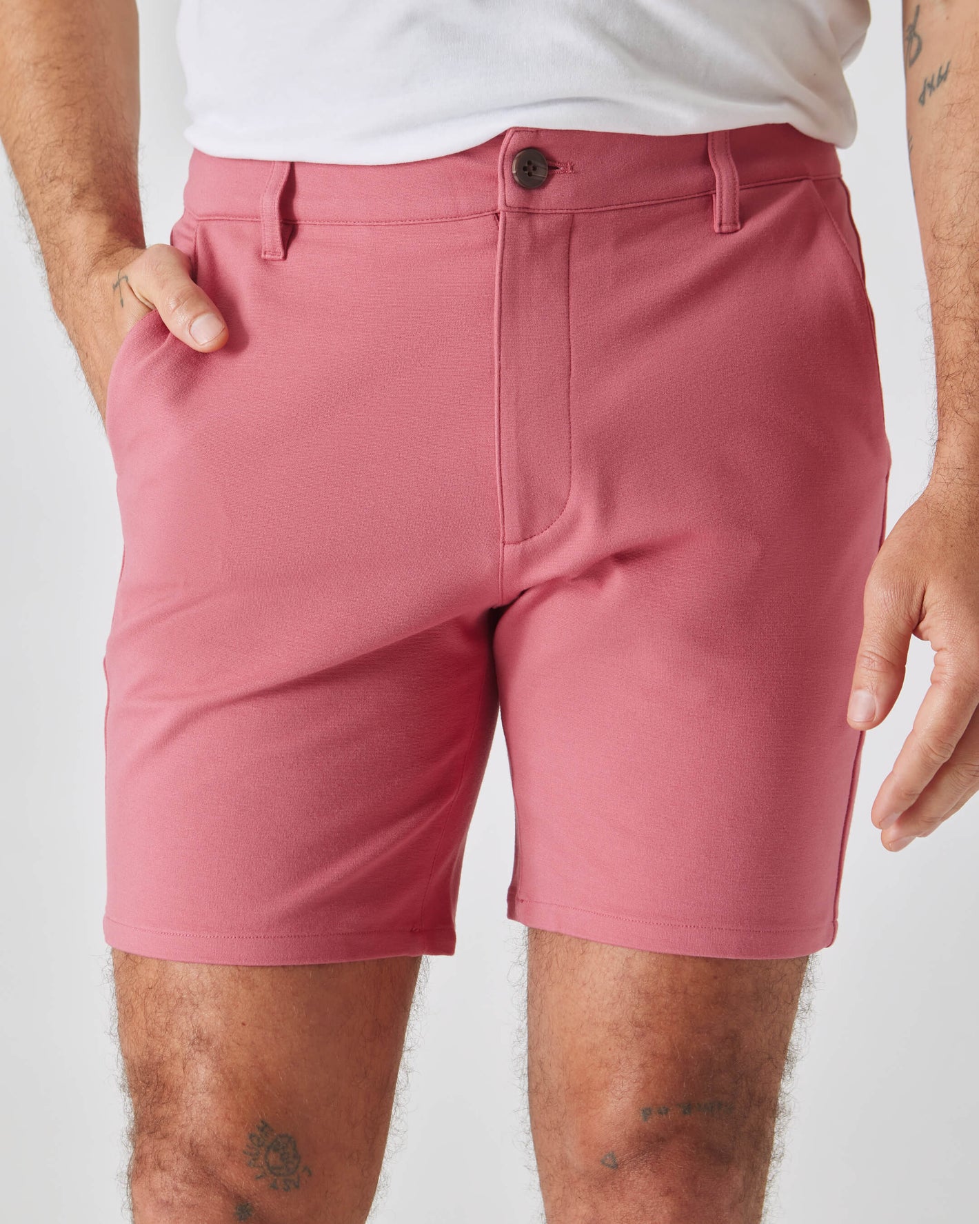 7 Rosewood Comfort Knit Chino Shorts worn with white T-shirt.
