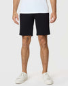 9 Black Classic Twill Shorts on model, paired with white sneakers.