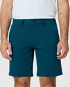 Centurion Twill Short on model, mid-thigh length, teal-blue, slim fit.