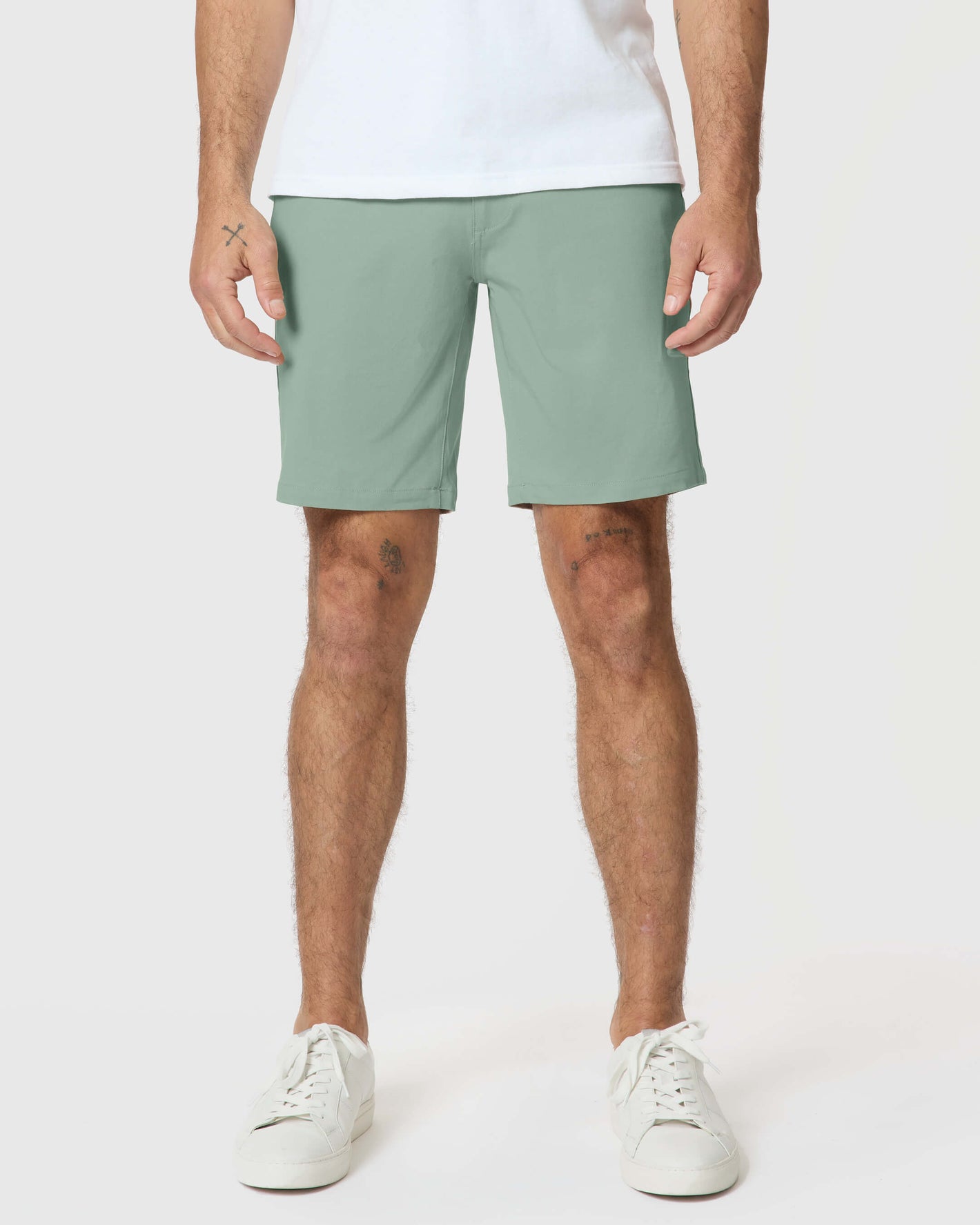 Meadow Twill Short on model with tattoos, paired with sneakers.