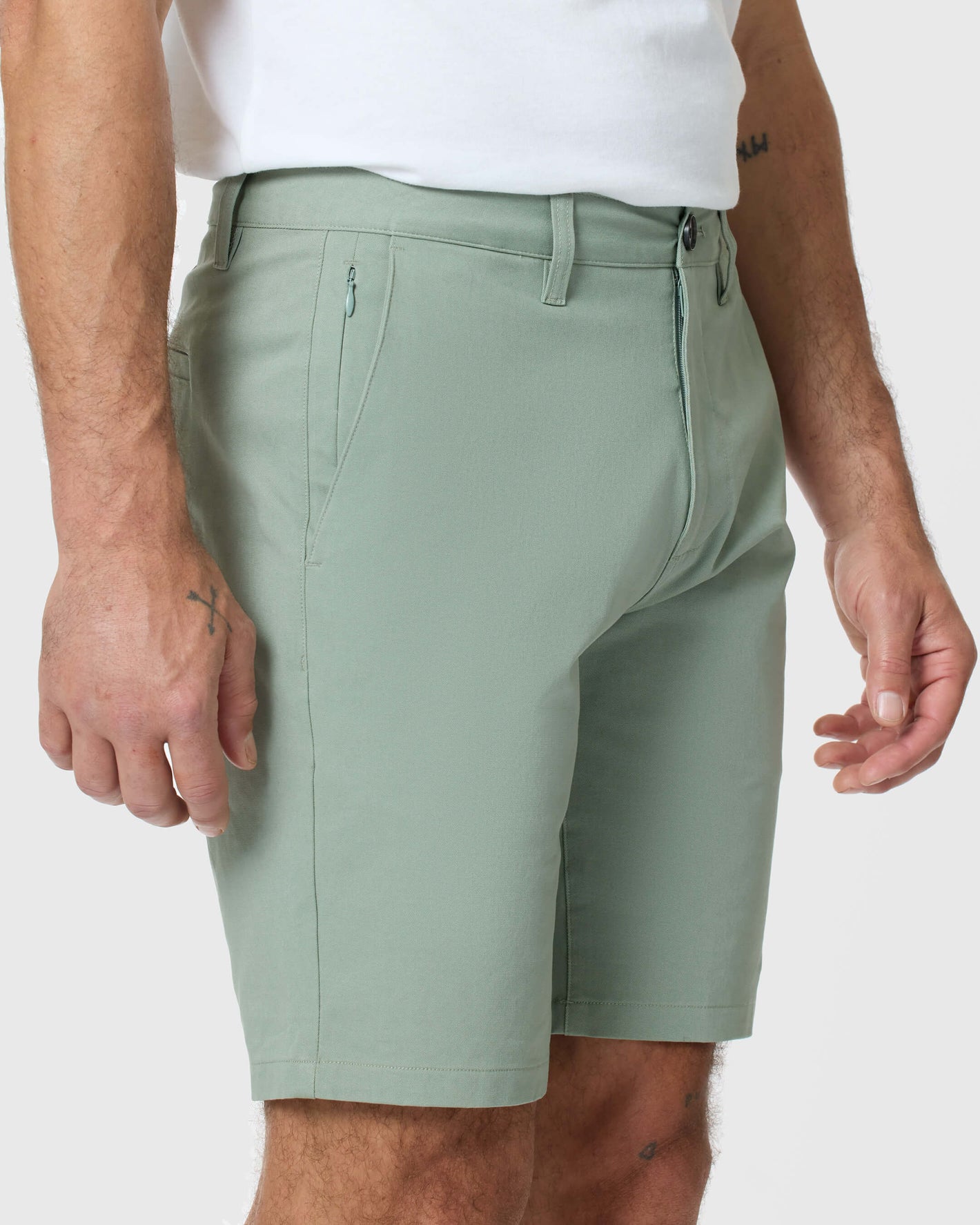 Meadow Twill Short modeled with a white tucked-in T-shirt.