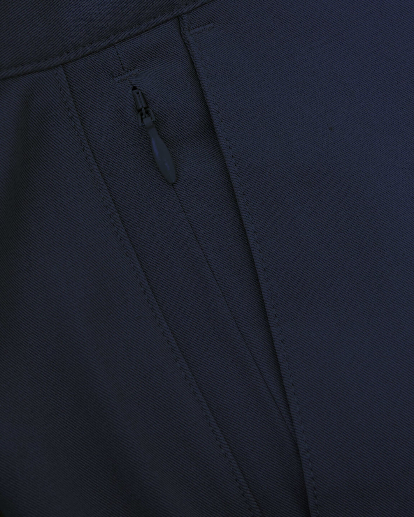 Close-up of Navy Twill Short's seam with concealed zipper.