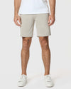 Man wearing Sandstone Twill Short with white sneakers.