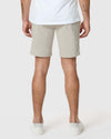 Back view of Sandstone Twill Short worn with white sneakers.