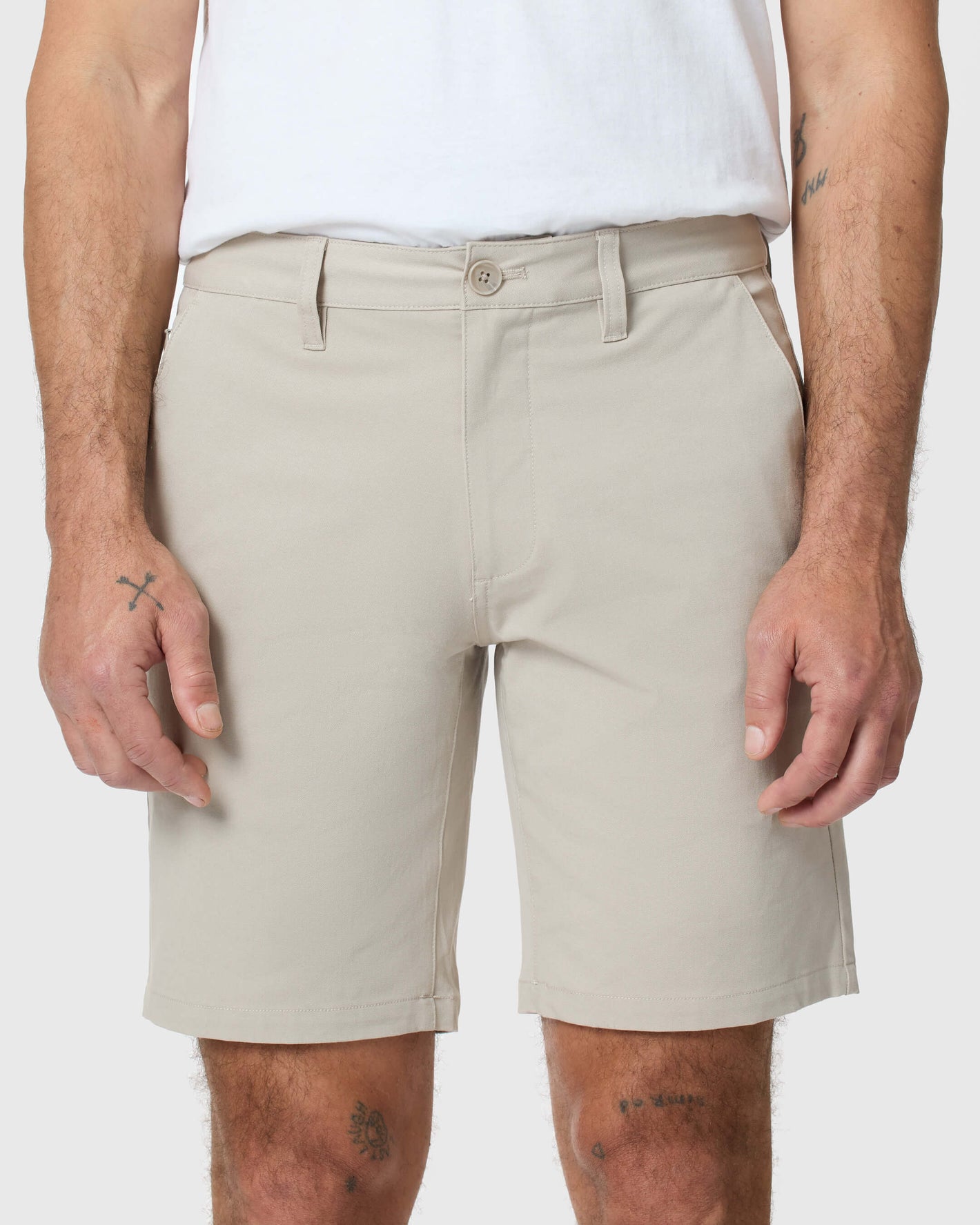 Sandstone Twill Short, slim fit, tattoos visible on hand and legs.