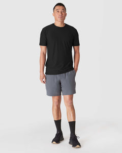 True ClassicModel wearing Carbon 7 2-in-1 Training Shorts with pockets and comfort liner.