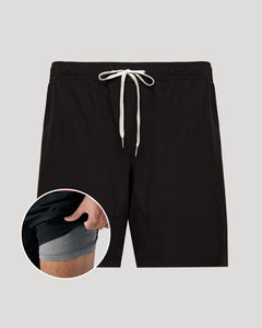 True ClassicBlack shorts with a drawstring on a gray background, showing a close-up of the waistband.