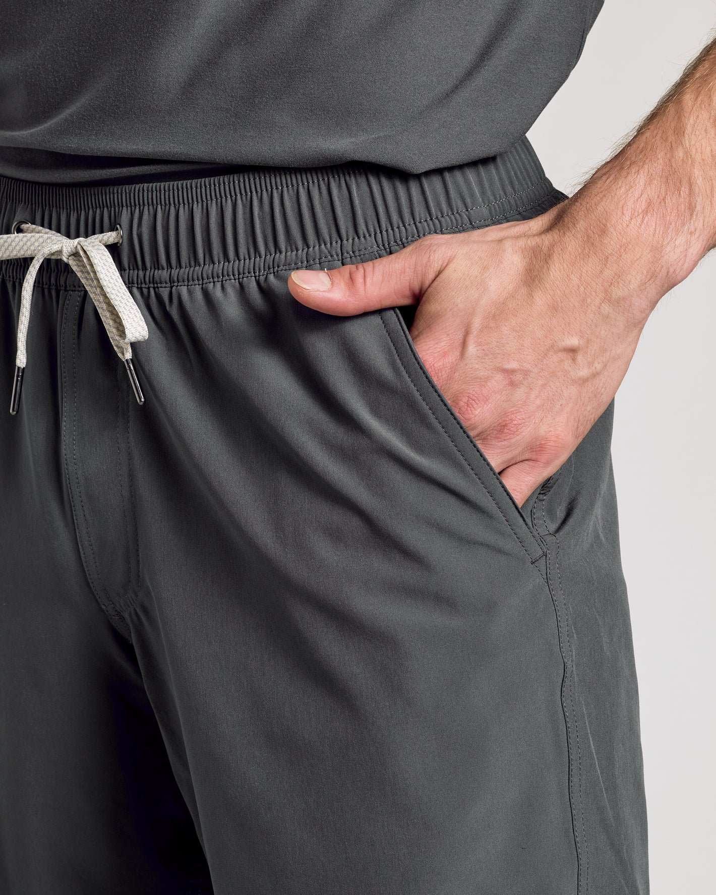 9 All Carbon Active Quick Dry Shorts showing elastic waist and pocket.