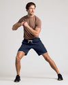 Man wearing Navy 9 Active Quick Dry Shorts, athletic stance, fitness pose.