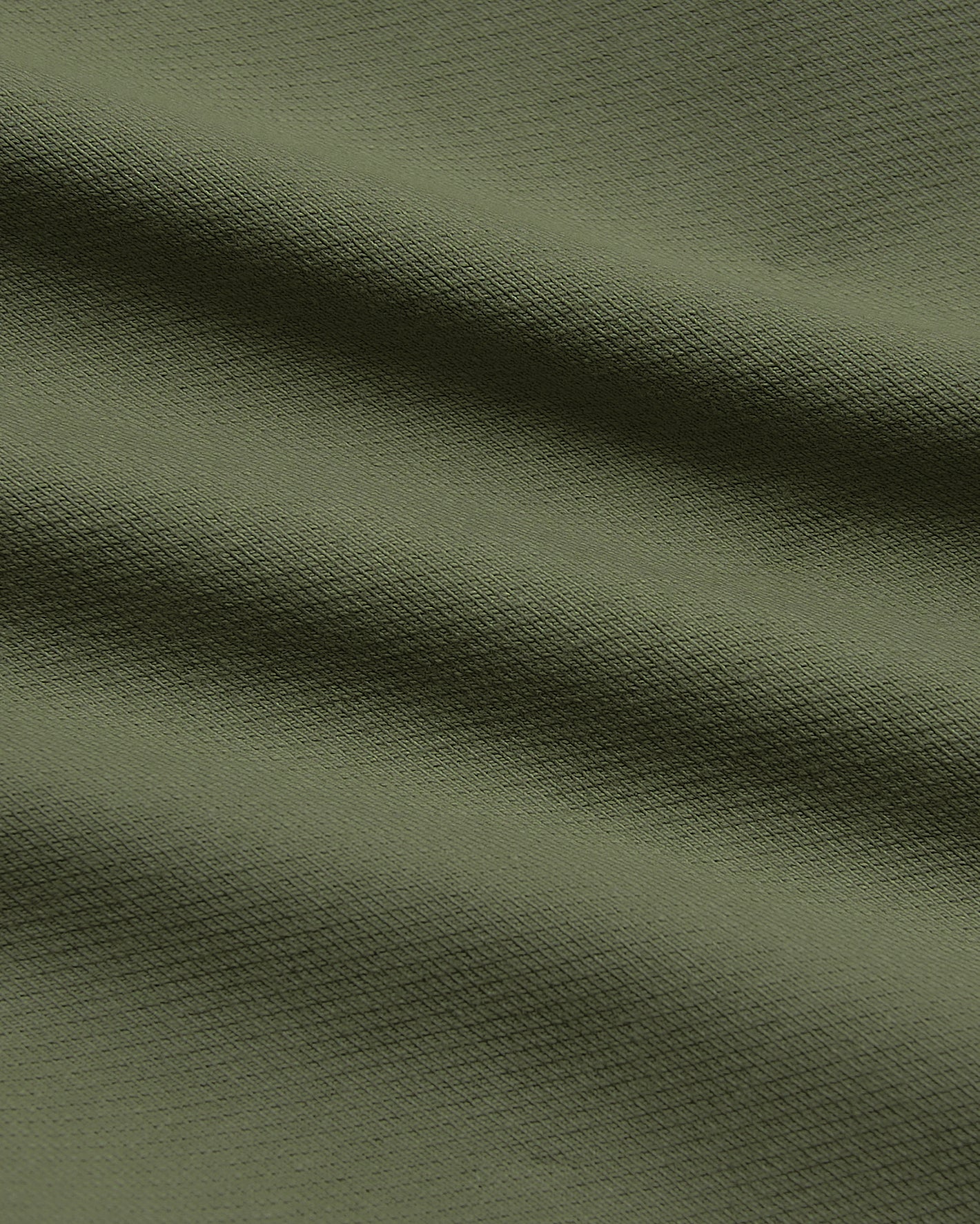9 Military Green Chino Shorts 2.0 with textured fabric folds.
