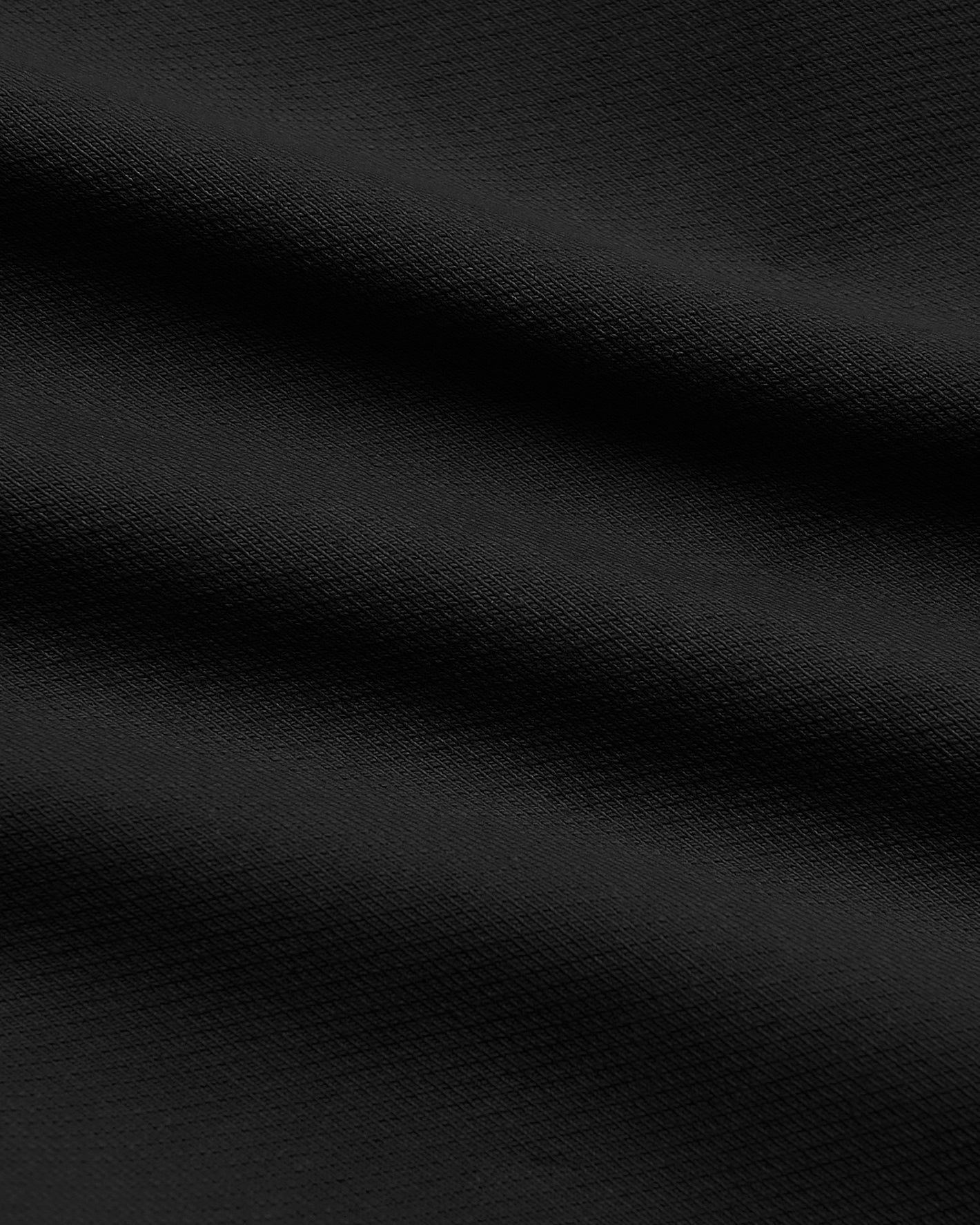 7 Black Chino Shorts 2.0, woven texture, subtle folds.