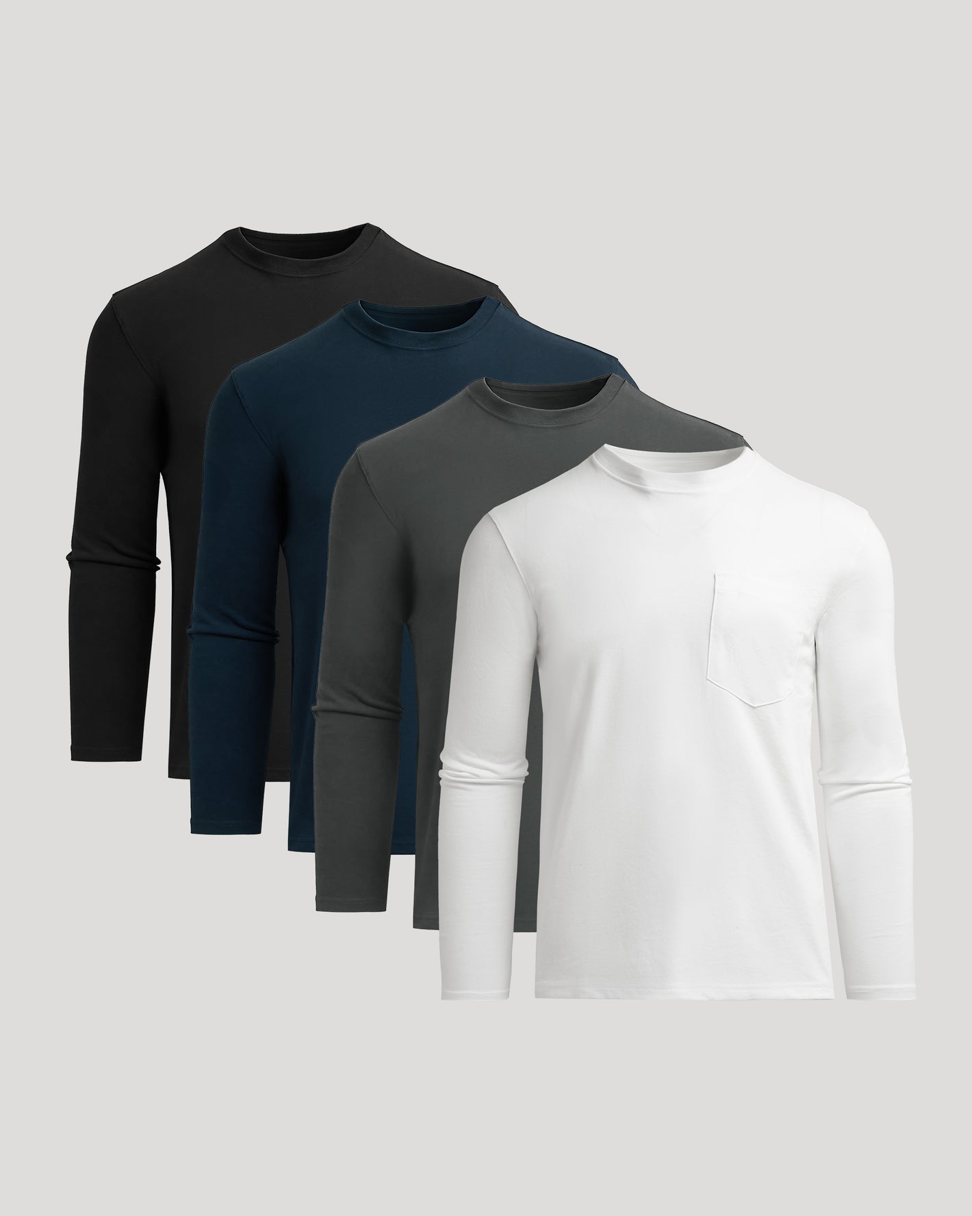 Staple Heavyweight Long Sleeve Pocket Crew 4-Pack shirts arranged in layers.