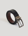 Casual Reversible Stretch Belt with gunmetal buckle, rolled-up.