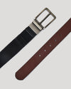 Casual Reversible Stretch Belt with black and brown sides, matte-silver buckle.