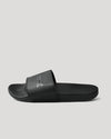 Black Comfort Slides with wide embossed strap, contoured footbed, and lightweight sole.