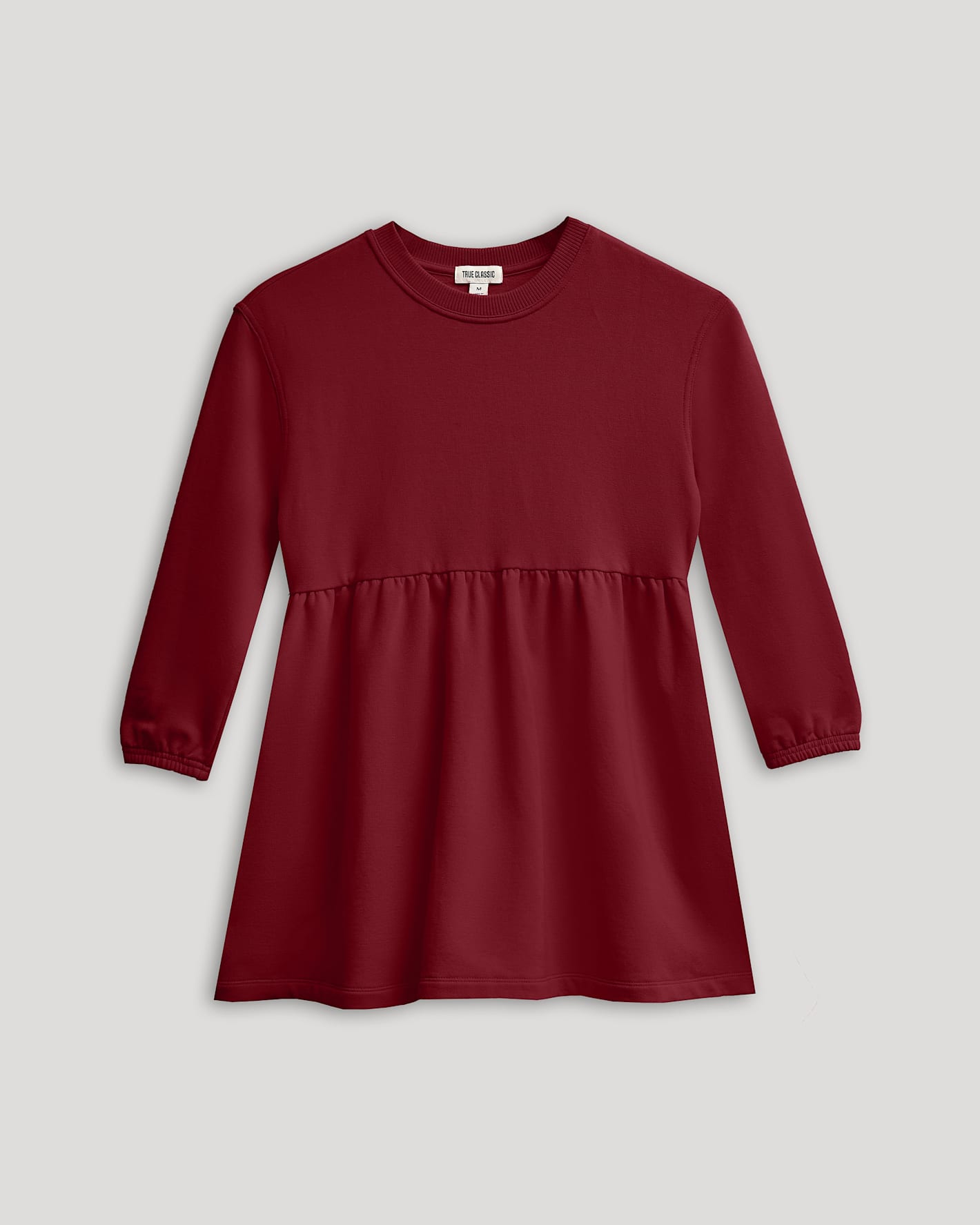 Girls Dark Maroon Long Sleeve Fleece Dress with empire waist and peplum.
