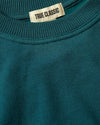 Teal crew-neck sweatshirt with TRUE CLASSIC label.