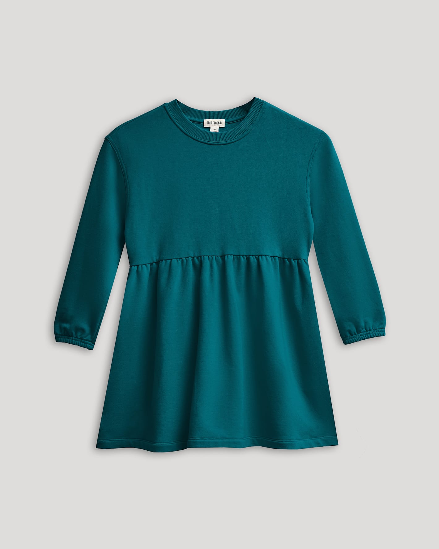 Girls Deep Emerald Long Sleeve Fleece Dress with gathered waistline.