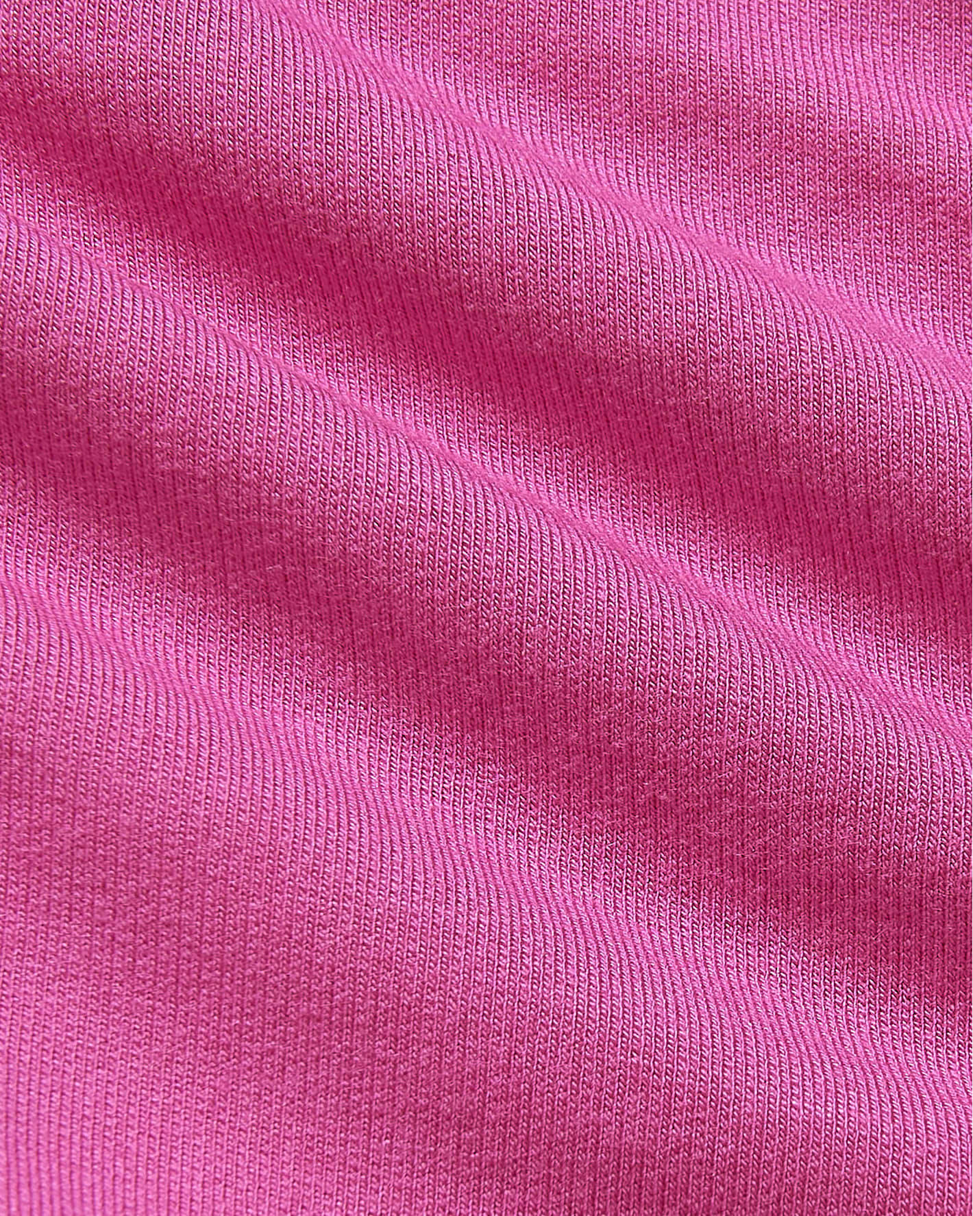 Girls Electric Fuchsia Long Sleeve Fleece Dress with ribbed knit pattern.