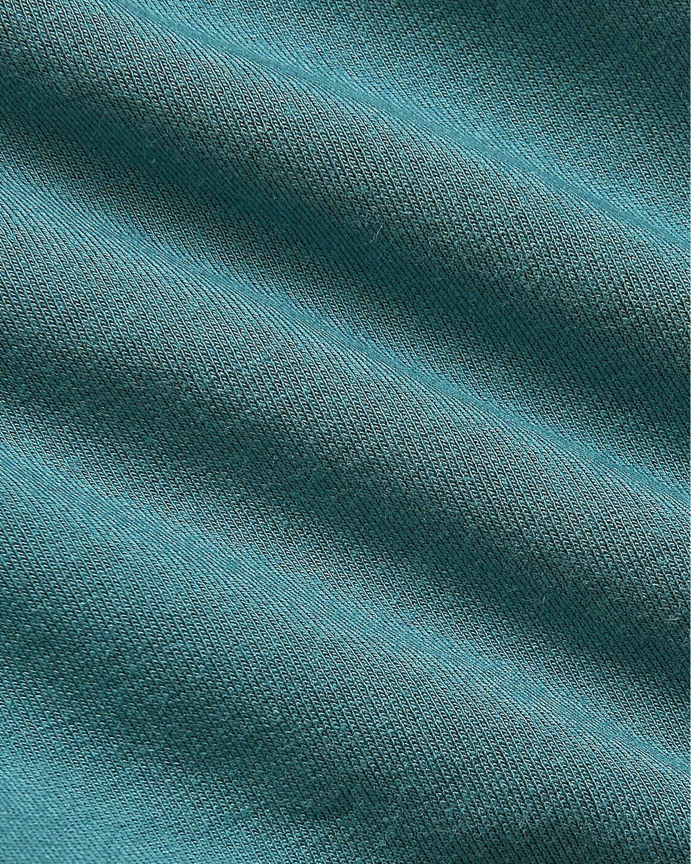 Girls Long Sleeve Fleece Dress 2-Pack, close-up of teal knit texture.
