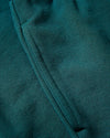 Girls Deep Emerald Cropped Zip Hoodie seam detail on knit fabric.
