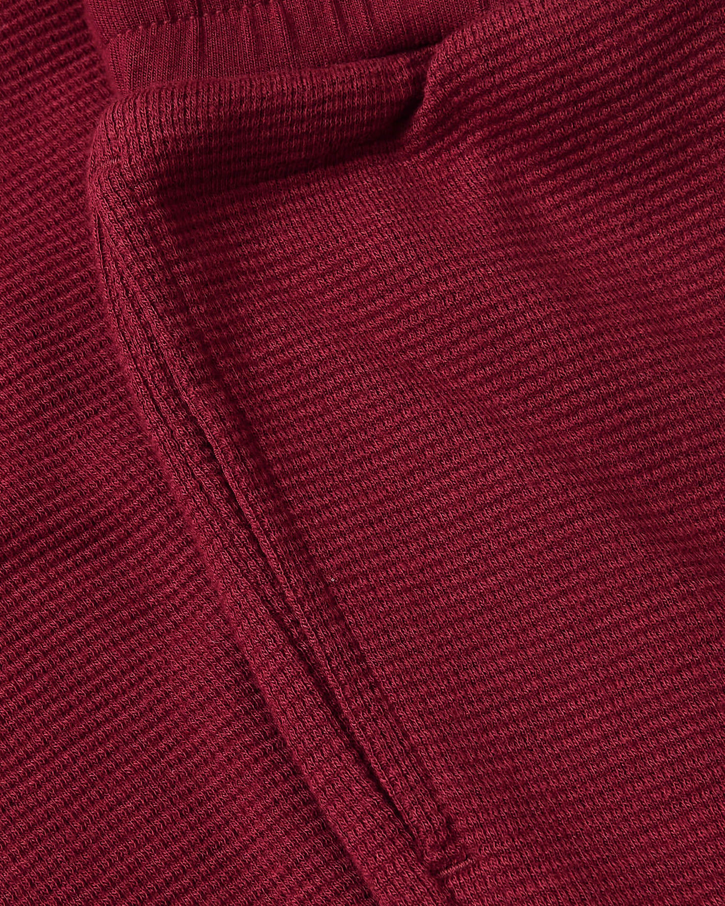 Girls Dark Maroon Waffle Long Sleeve Henley & Pants set, textured fabric close-up.